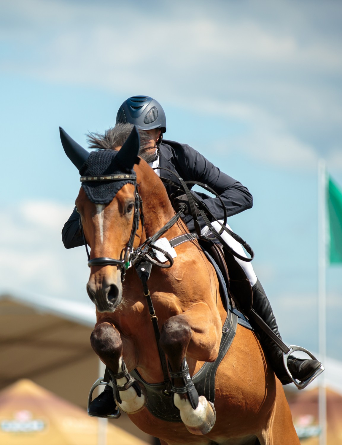Man on Horse Jumping - Benefits of Chiropractic Care